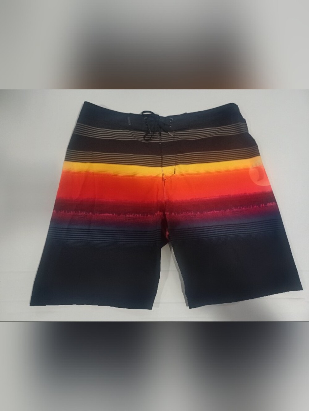 Hurley Phantom  Black Board Shorts with Red and Yellow Gradient Stripes